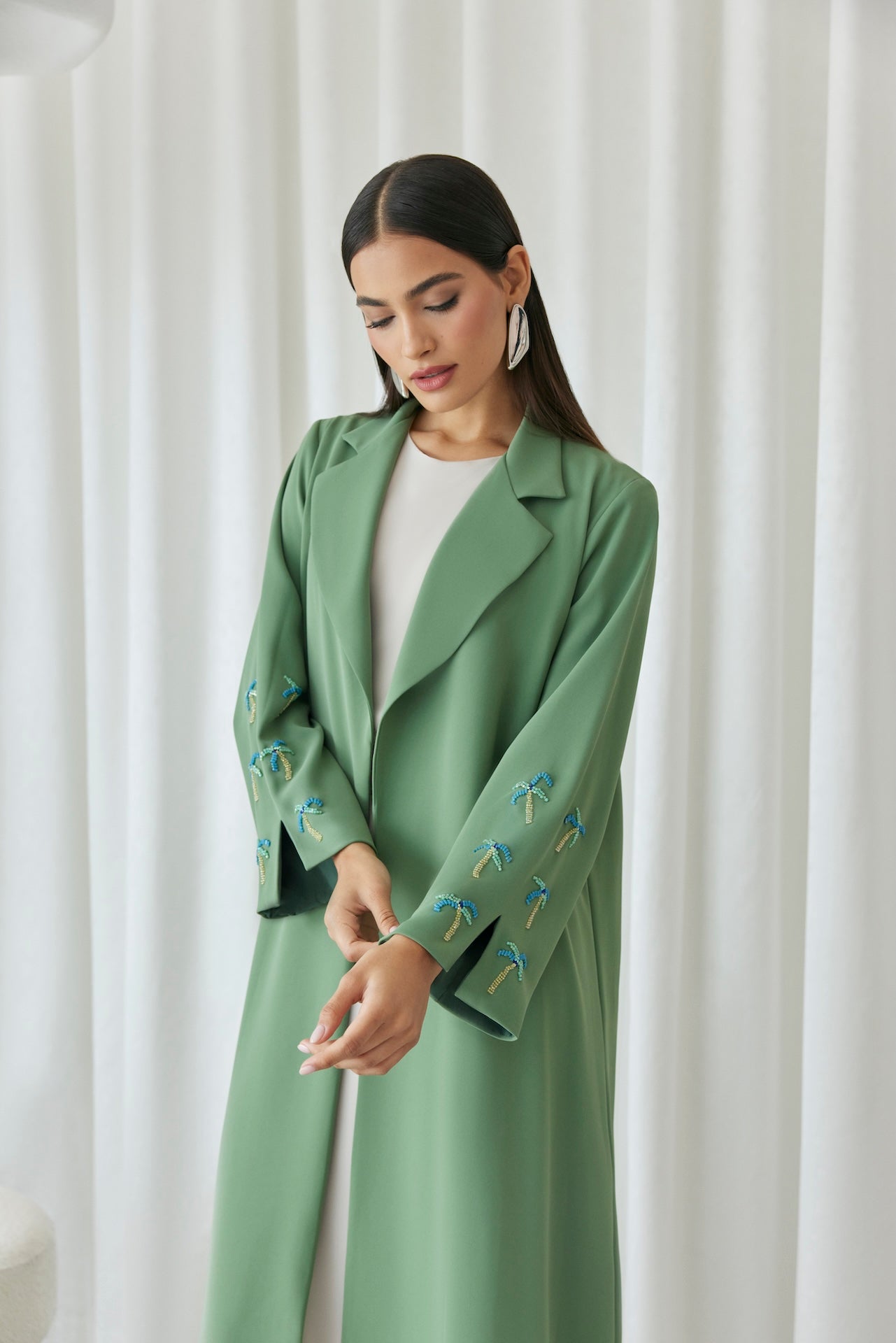 Green Mirage - The McQueen Boutique - Abaya - Abaya Dubai - Abaya Abu Dhabi - Abaya UAE - Abaya - Elegant - Luxury - Emirati - Classic - Modern - Occasion - Traditional - Trends - Embroidery - Modes